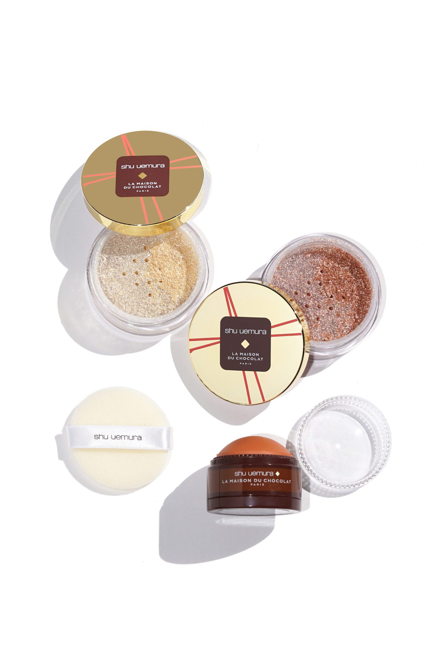 Shu Uemura Shimmer Powder and Creamy Dome Blush swatches